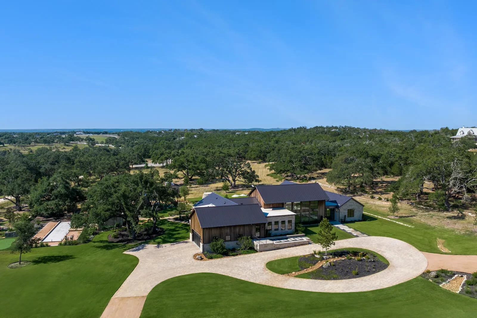The Lazy L - custom home by Jenkins Design Build Austin TX