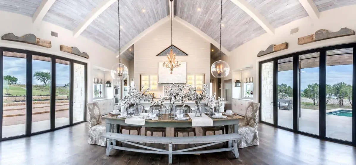 modern farmhouse, kitchen, wooden bench, cotton, lighting, large windows, wooden, lights, chairs, table, bench, beams, chandelier, pool, luxury, home, homes, custom homes, jenkins, hill country