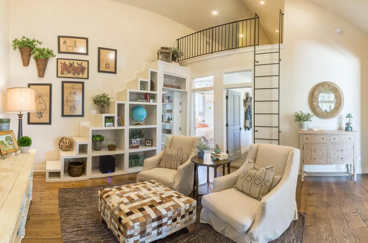 jenkins, hill country, loft, living room, farmhouse, modern, luxury, custom home, custom homes, home, bookcase, staircase, library, wooden floor, furniture, couches, chairs, rustic, white walls, metal ladder, ladder to loft