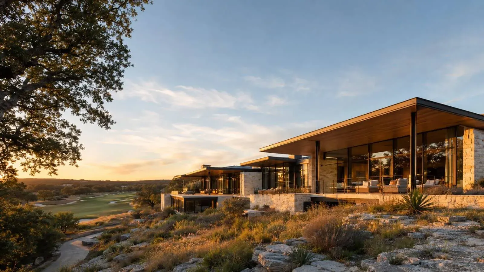 Modern custom estate on an Amarra Drive homesite in Barton Creek at dusk