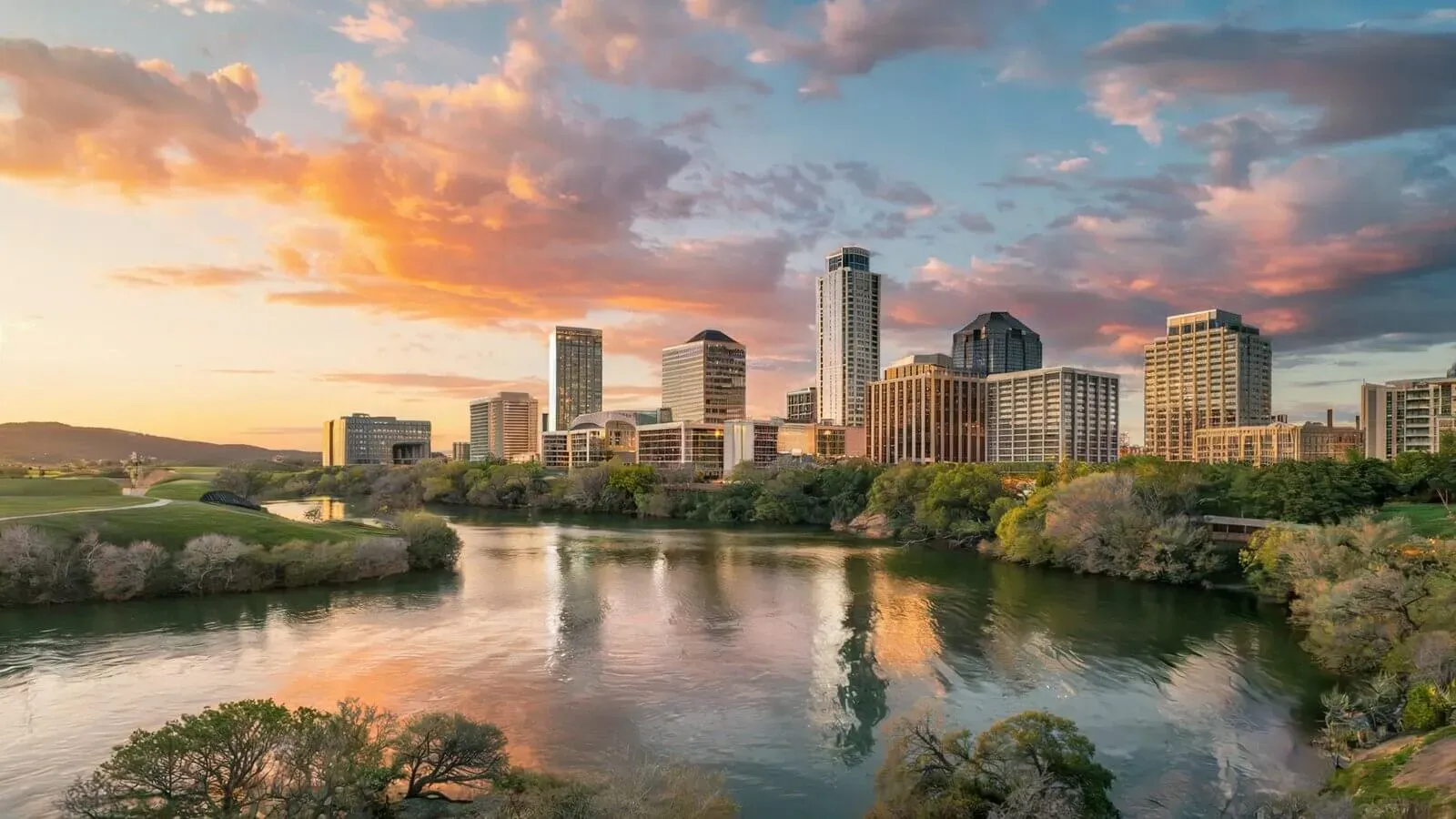 Where we build in Austin, skyline and Lake Travis at sunset in the Texas Hill Country
