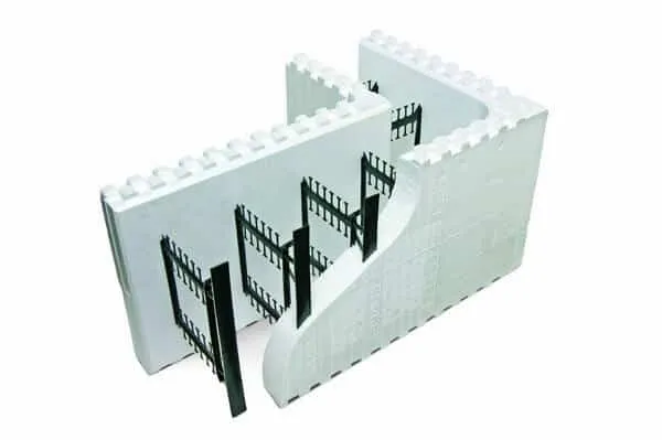 Interior view of insulated concrete forms (ICF) wall construction showing stacked foam blocks and reinforced concrete core