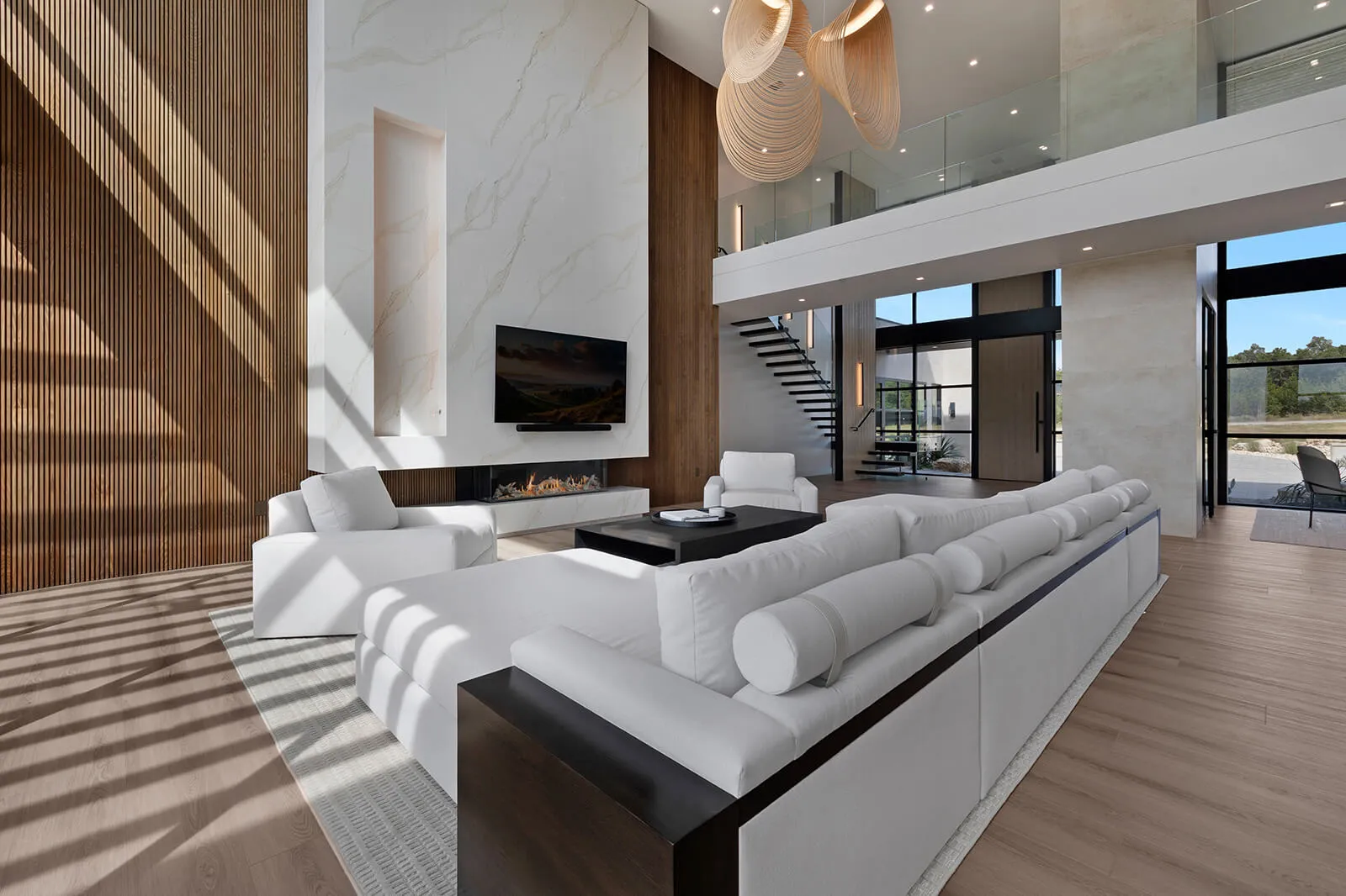 Two-story great room with modern volume and light