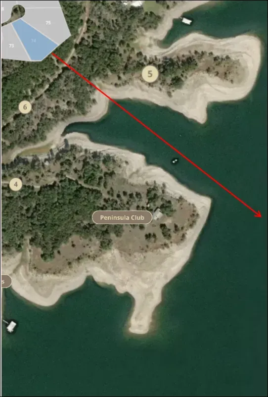 Aerial view of Travis Club Austin Lot 74 with Lake Travis shores and private marina